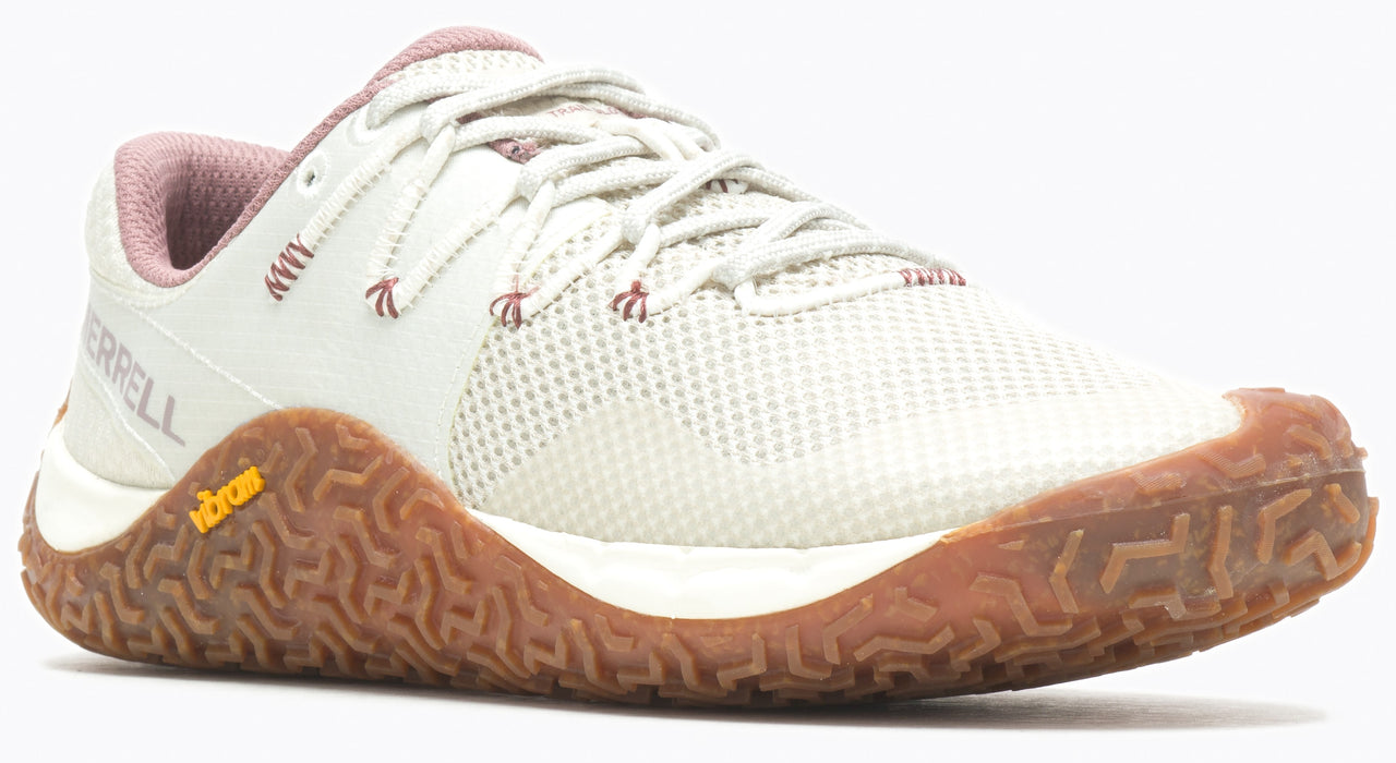 A women's light-beige athletic shoe with a brown sole, light-beige laces, and mauve lining.