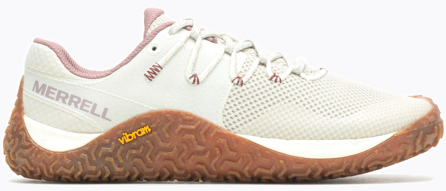 A beige athletic shoe with light brown sole and "MERRELL" and "Vibram" text.
