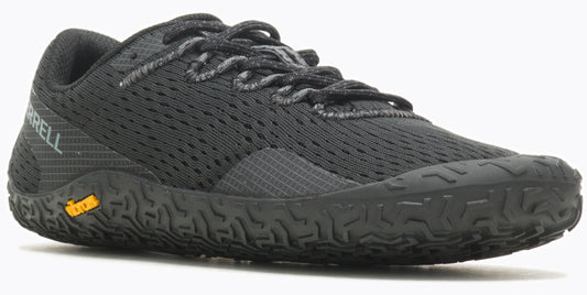 Black athletic shoe with a low profile, laces, and a grippy sole.