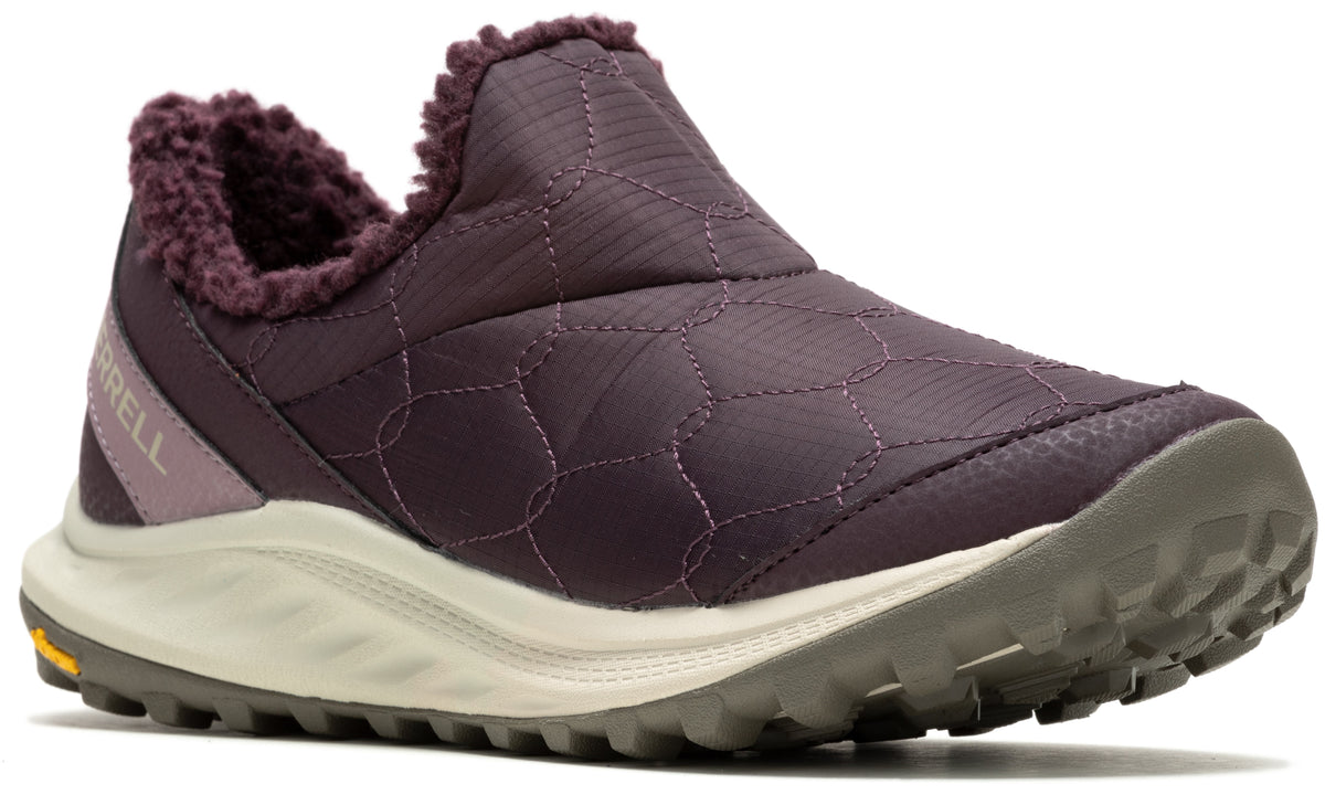 Slip-on shoe with a purple quilted upper and fuzzy collar, a light beige midsole, and a lugged gray outsole.