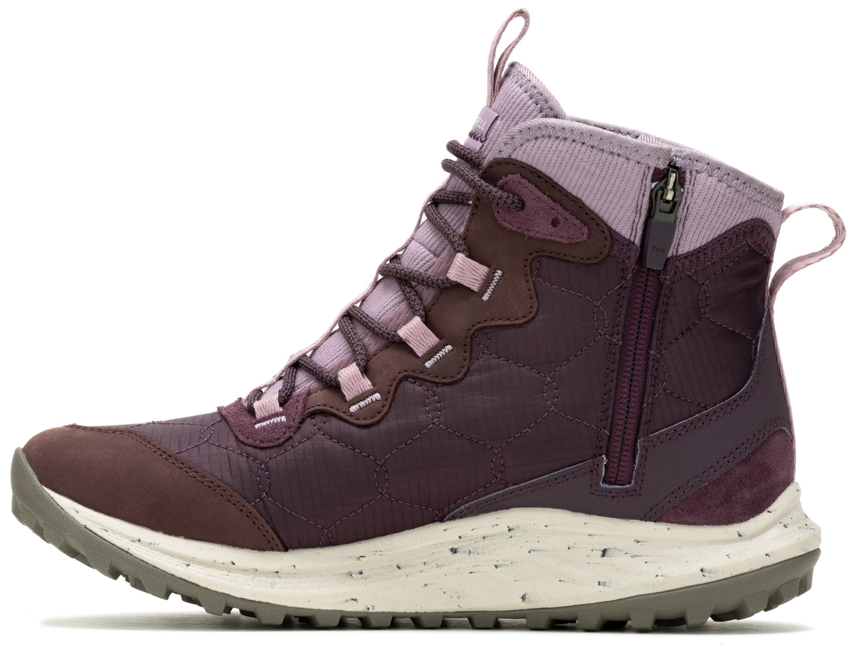 Side view of purple quilted hiking boot with front laces and side zipper.