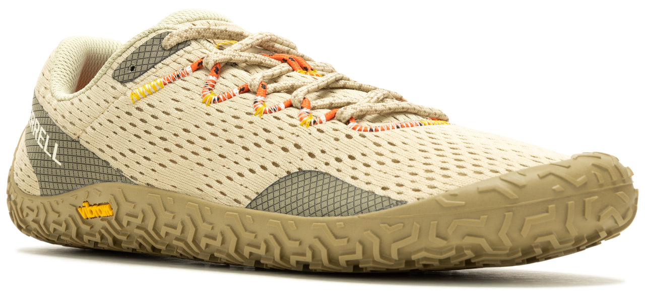 Tan running shoe with orange laces and textured sole.