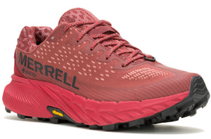 Red running shoe with black accents and the text "MERRELL GORE-TEX" on the side.