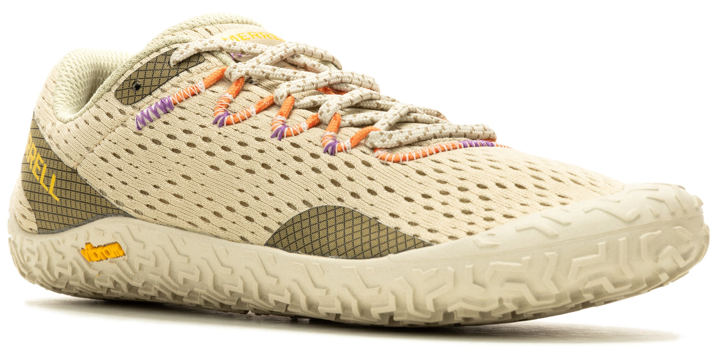 A low-profile shoe with a beige mesh upper, textured sole, and patterned laces.