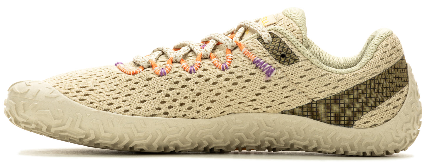 A beige running shoe with orange and purple accents on the laces and a textured sole.
