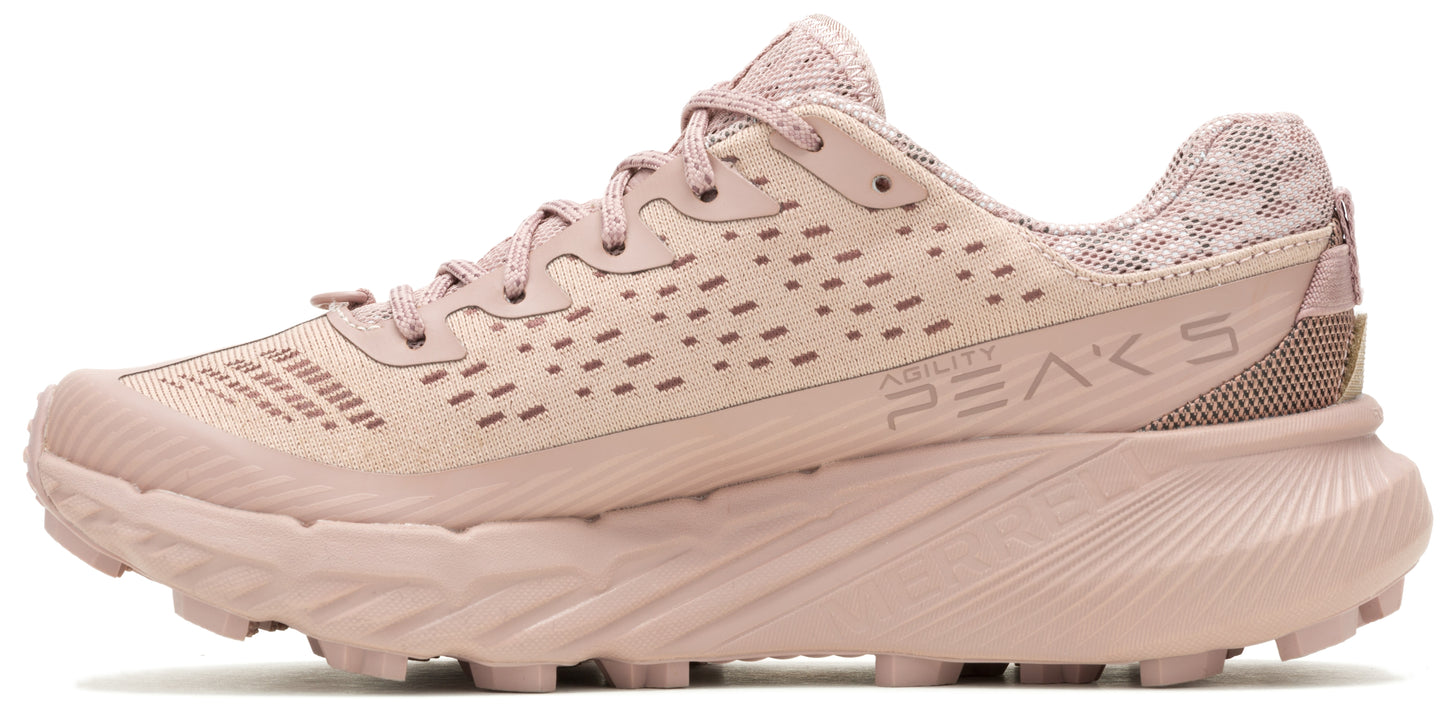 A side view of a pink running shoe, with the words "ABILITY PEAKS 5" visible on the side.