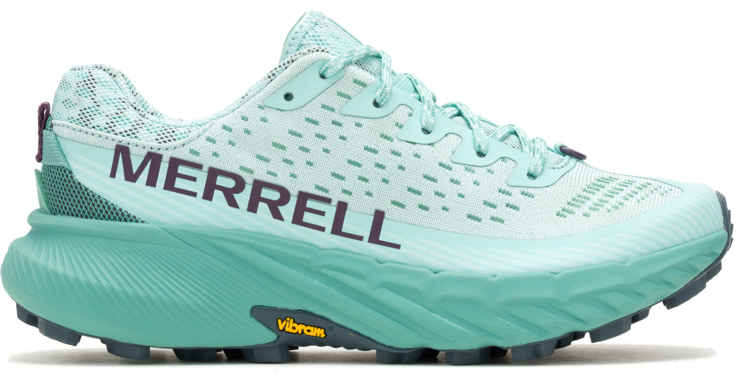 Mint green trail running shoe with dark purple logo and pull tab.