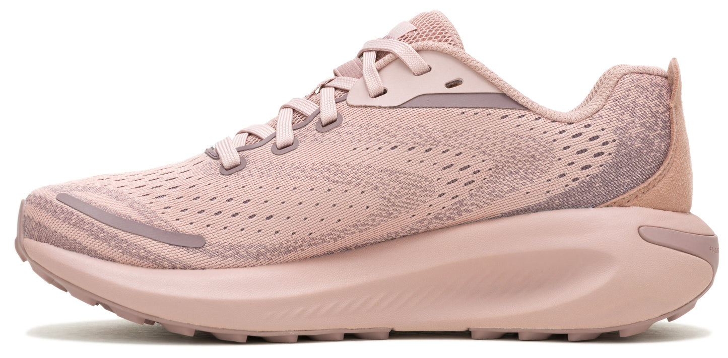 A pink running shoe with mesh upper and a thick sole.