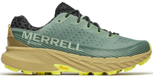 A low-top athletic shoe with a green perforated upper, black patterned collar, and a yellow and tan jagged sole; "MERRELL" and "GORE-TEX" are printed on the side.