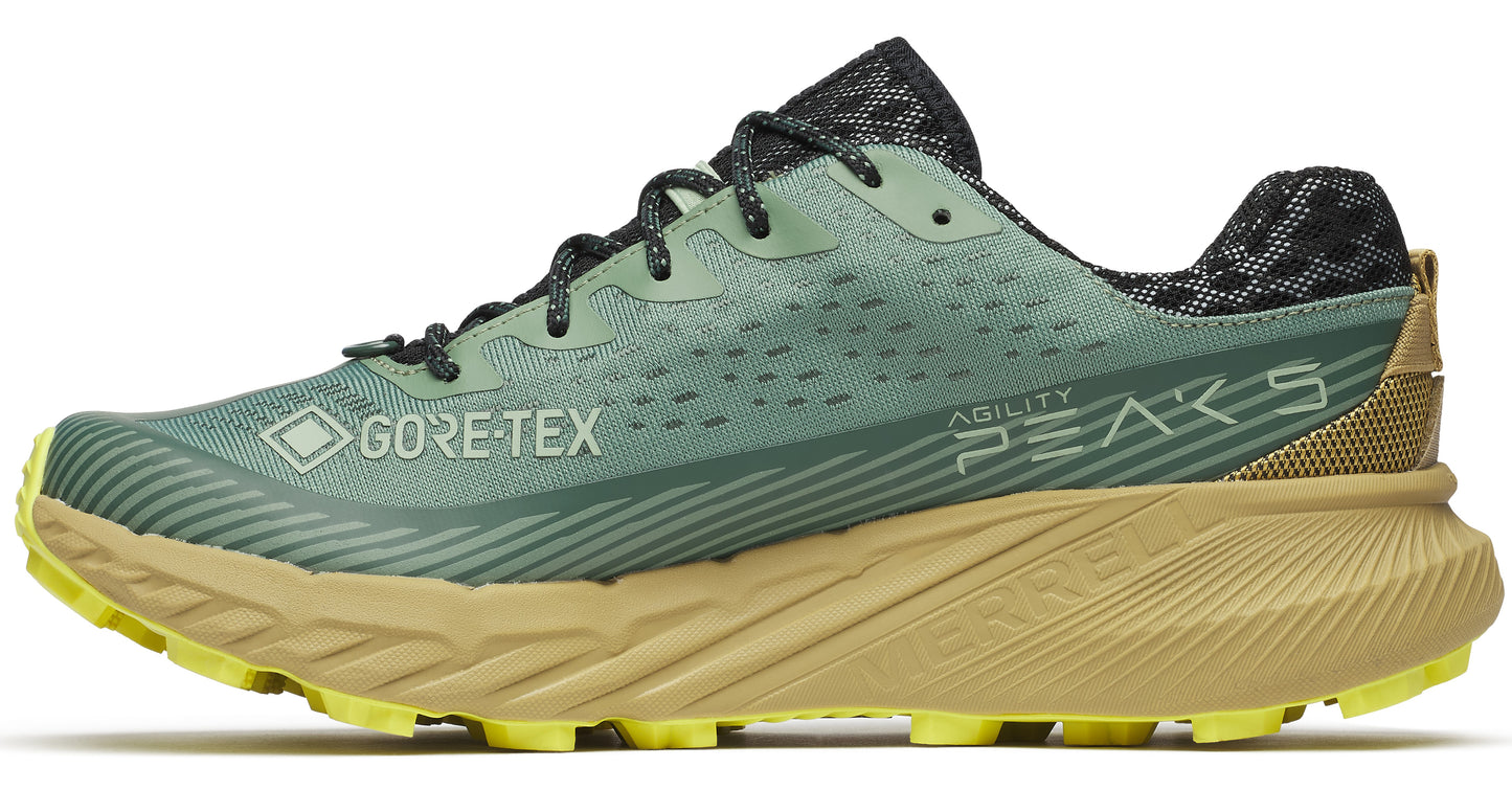 Green running shoe with black laces, yellow sole, and GORE-TEX label.