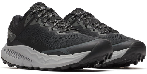 Pair of low profile, black trail running shoes with gray soles and patterned laces.