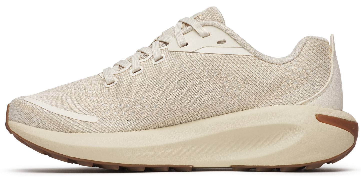 Beige running shoe with a thick sole.