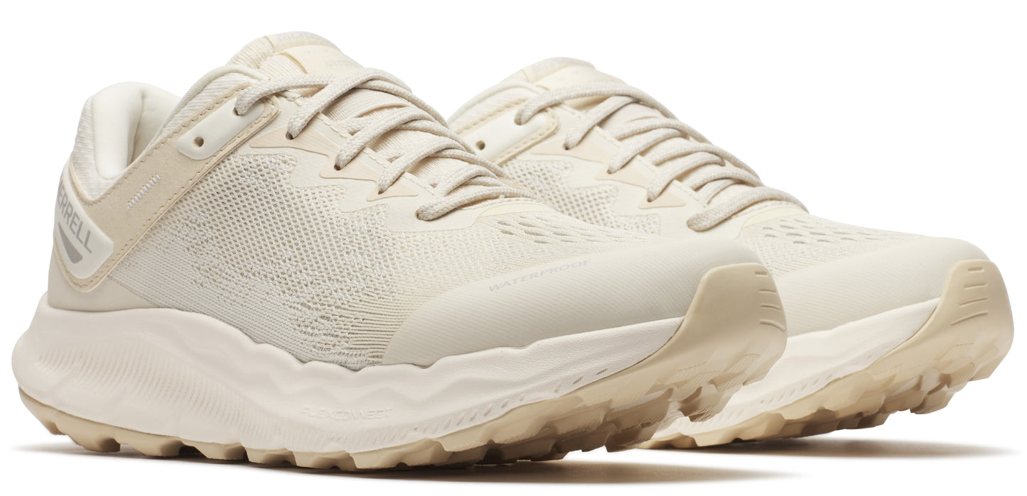 Beige athletic shoes with laces.