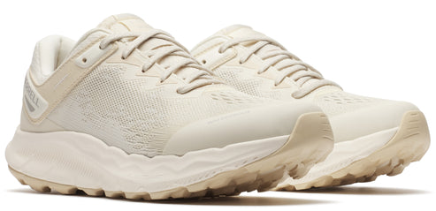 Beige athletic shoes with laces.