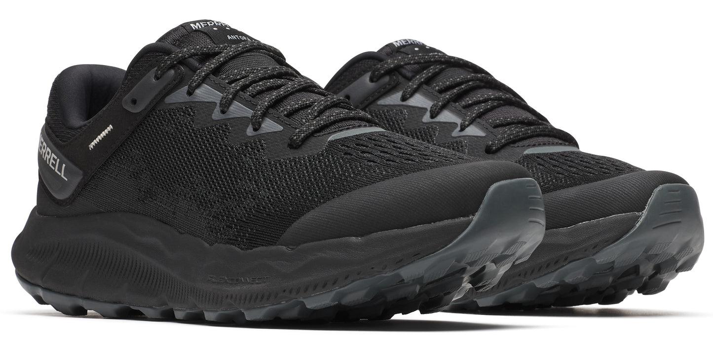A pair of black trail running shoes with a lugged outsole.