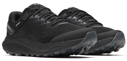 A pair of black trail running shoes with a lugged outsole.