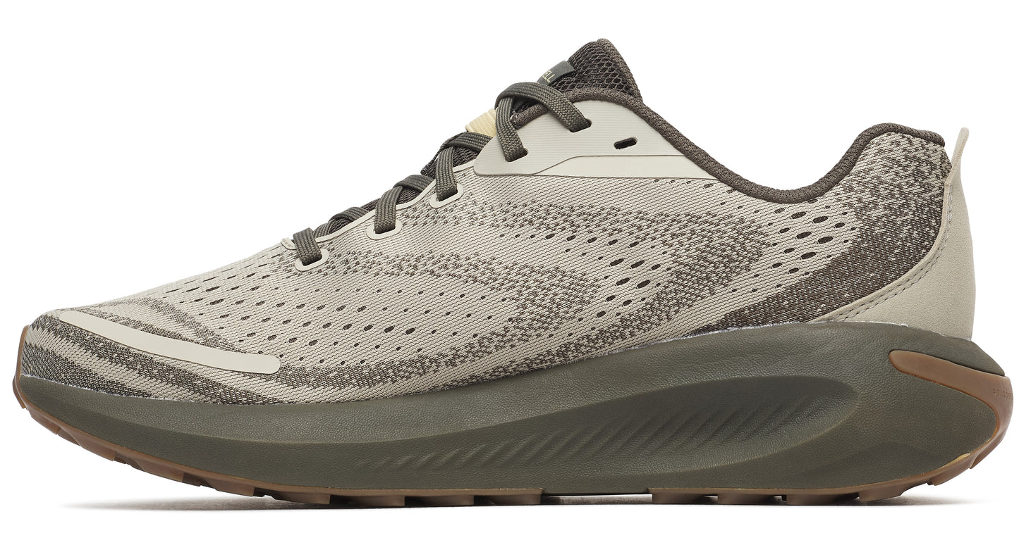 Side view of a speckled beige running shoe with a thick, gray-green sole and brown-tread bottom.