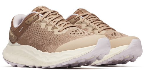 Tan athletic shoes with thick cream colored soles.