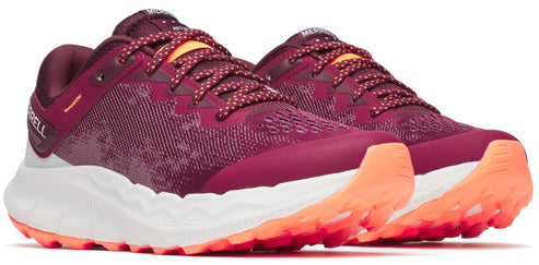 Two burgundy running shoes with white and orange soles and dotted laces.