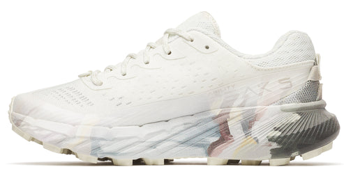 A running shoe that is all white with a decorated sole.