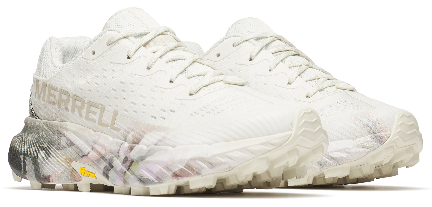 A pair of white running shoes with the word MERRELL printed on the side.