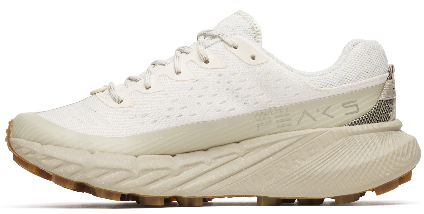 Beige running shoe with gum sole, white laces and 'SPEED PEAKS' printed on the side.