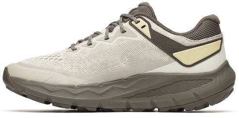 A running shoe with a thick, patterned sole, light-colored upper, and gray laces.