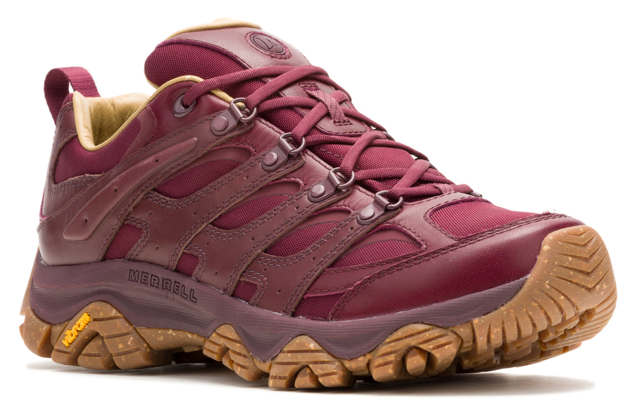Maroon low-rise shoe with a tan sole and laces.