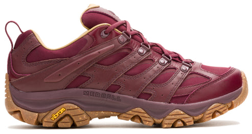 A maroon hiking shoe featuring a lugged sole.