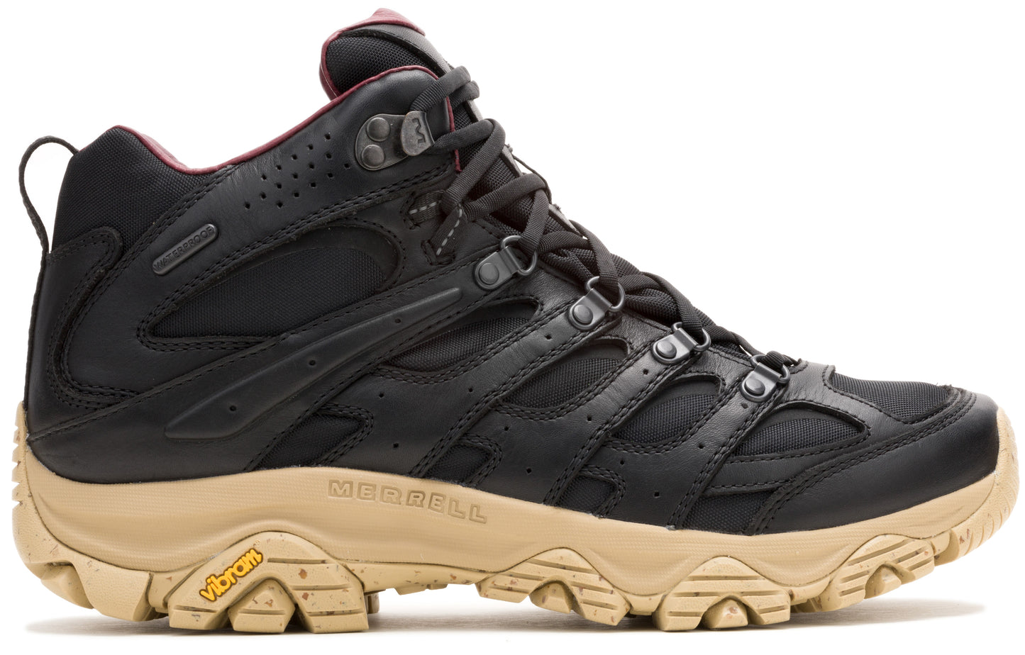 Black hiking boot with tan sole.
