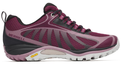 A women's low-profile purple trail running shoe with black accents and a white vibram sole.