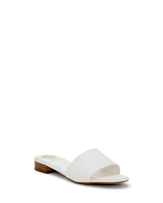 White slide sandal with short, stacked heel.