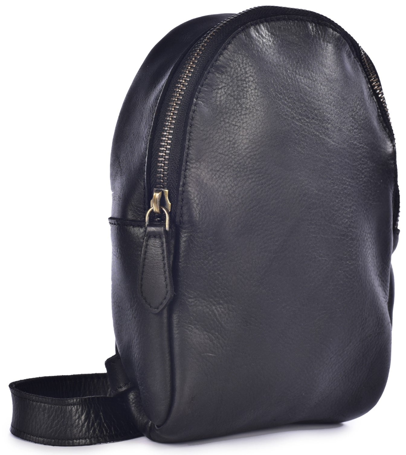A minimalist, black leather, teardrop-shaped backpack standing upright, featuring a single prominent silver zipper along the top and side, and a simple black shoulder strap at the base.