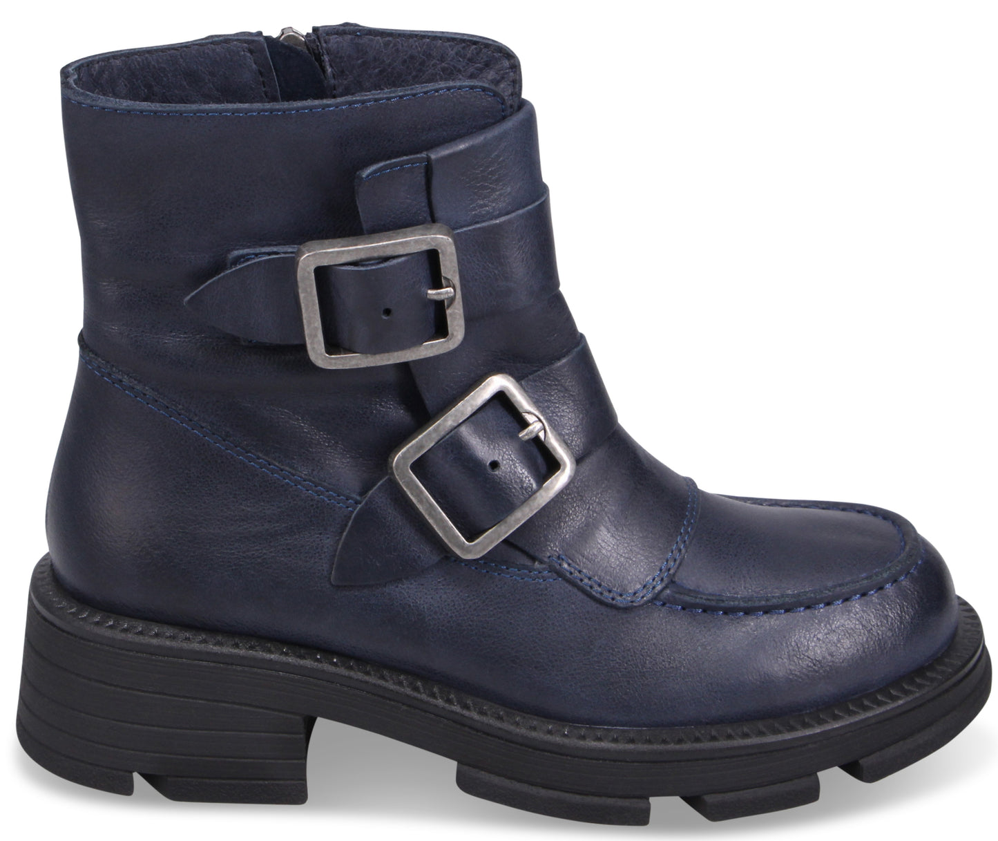 Navy blue leather ankle boot with a thick, black lug sole and two decorative silver buckles.