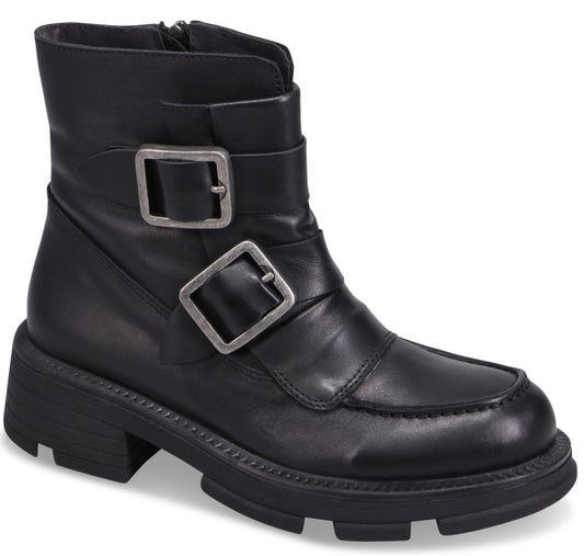 Black ankle boot with two decorative straps and silver buckles, lug sole.
