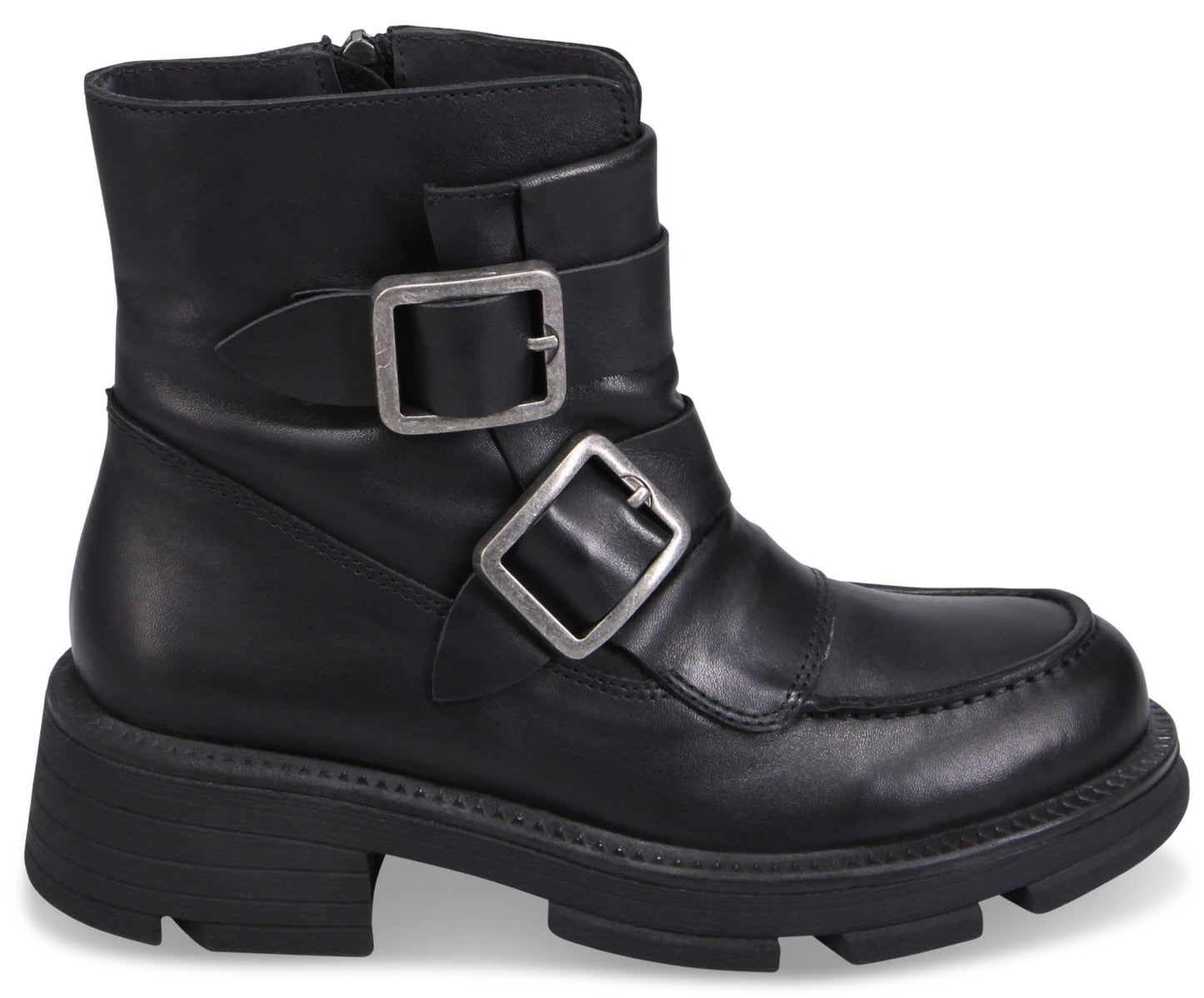 Black ankle boot with silver buckles and thick lug sole.