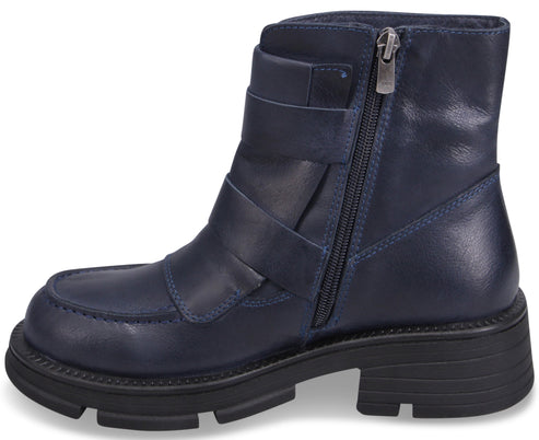 Side view of a navy blue leather ankle boot with buckle straps and a chunky black sole.