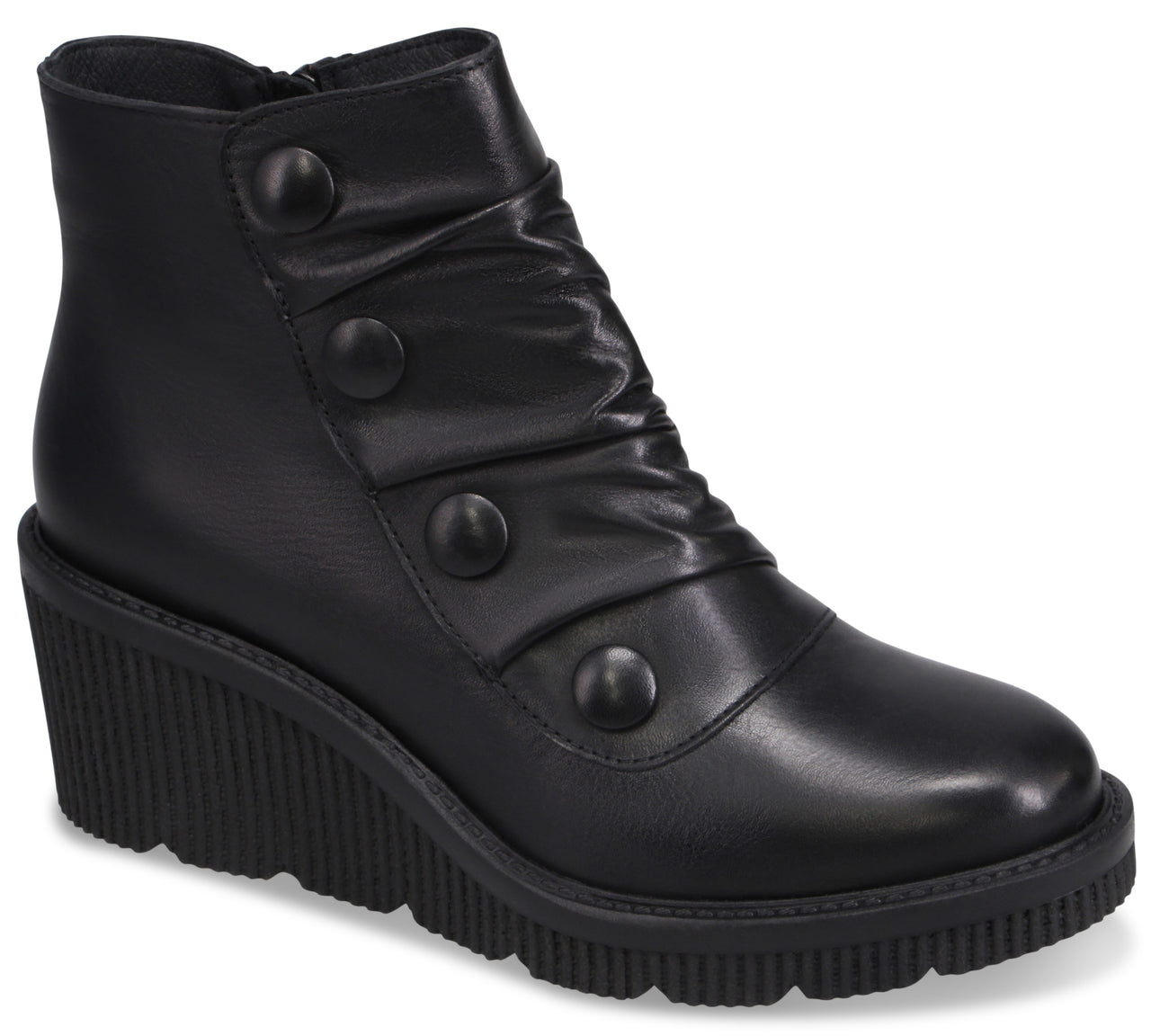 A black ankle boot with a rounded toe, a high wedge sole with a ribbed texture, and decorative buttons running diagonally up the side, which also features subtle ruching.