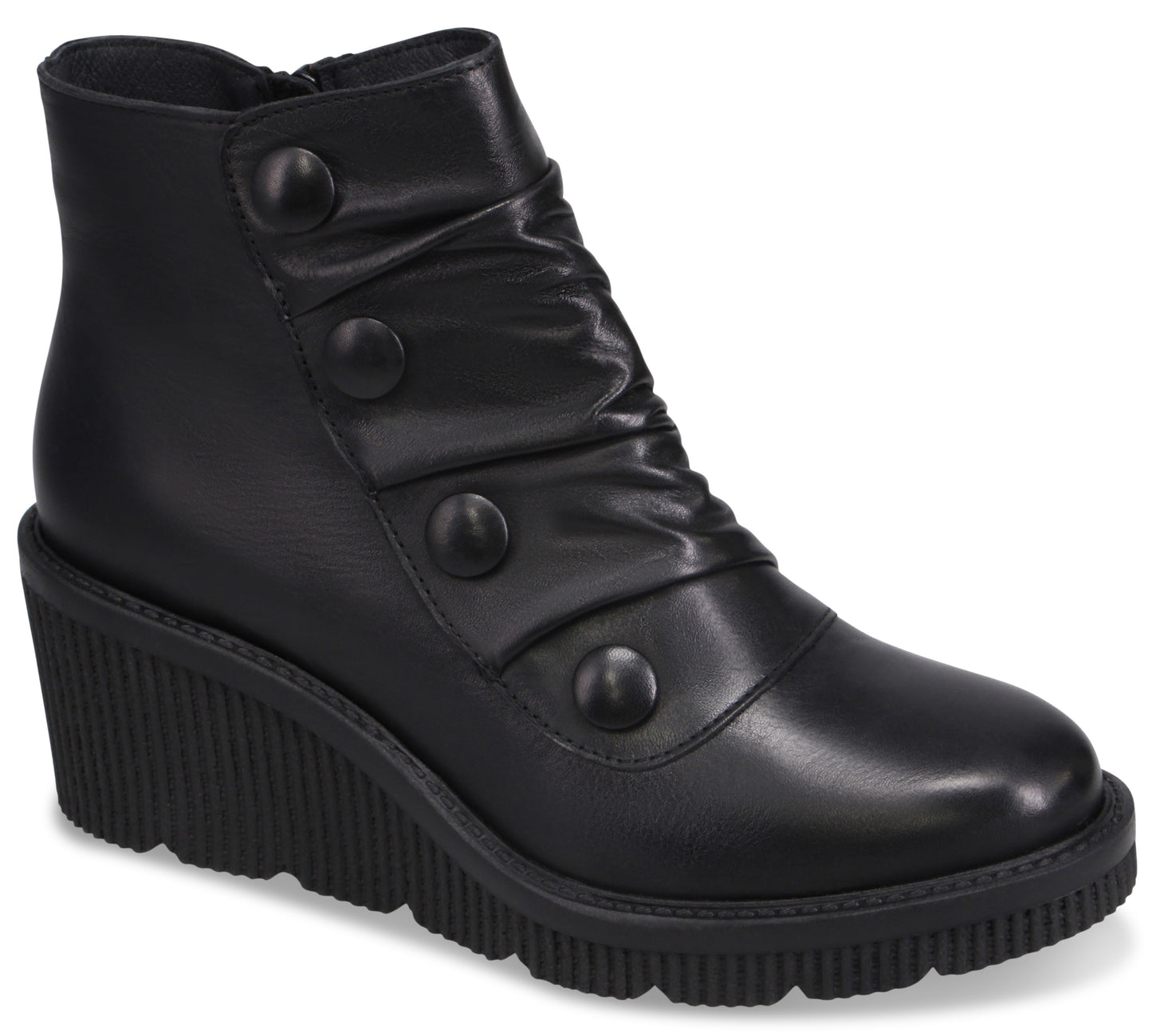 A black ankle boot with a rounded toe, a high wedge sole with a ribbed texture, and decorative buttons running diagonally up the side, which also features subtle ruching.