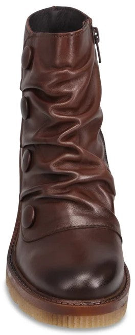 A brown leather ankle boot with a side zipper, featuring ruched detailing on the shaft, decorative side buttons, and a thick, textured, light brown platform sole.