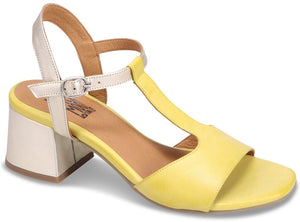 Yellow leather sandal with a low, block heel and a cream-colored ankle strap.