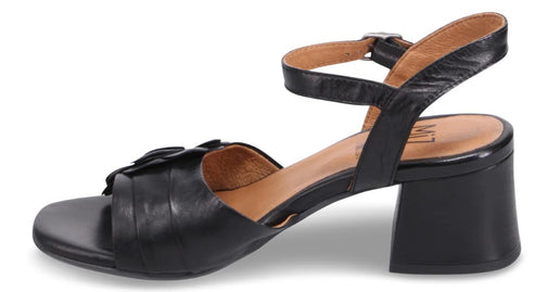 Black, low block heel sandal with an ankle strap and flower detail.