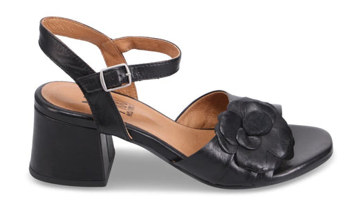 Black leather sandal with block heel and floral detail.