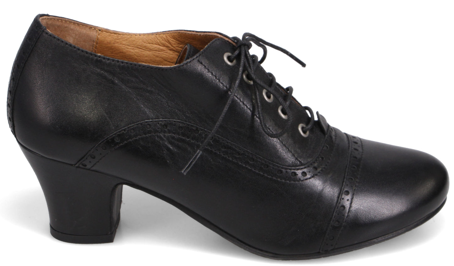 A black leather heeled oxford shoe with a rounded toe, lace-up front, and decorative brogue-style stitching along the toe cap and side panels.