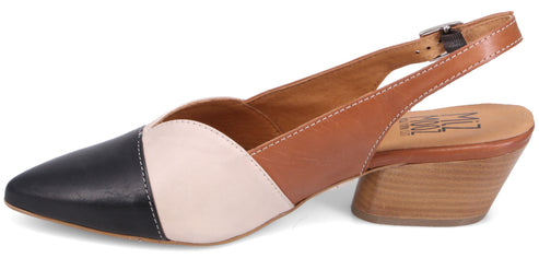 A tri-color slingback shoe in black, cream, and tan with a tan block heel and a silver buckle.