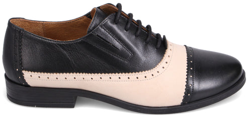 A dress shoe with black and beige split design.