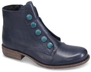 A navy blue leather ankle boot with a rounded toe, a low stacked heel, and a vertical row of five decorative teal-colored buttons along the side.