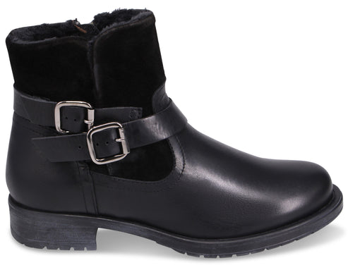 Black leather ankle boot with buckle strap and zipper.