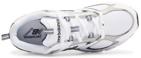 A top-down view of a white, silver, and black sneaker with mesh panels, white laces, and 'New Balance' branding on the insole.