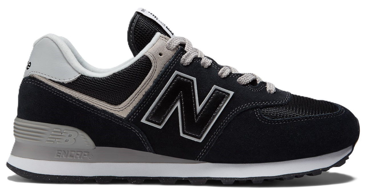 Black athletic shoe with gray accents, featuring a prominent 'N' logo on the side.